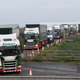 Lorries leave disused Manston Airport to attend a test drive to the Port of Dover.